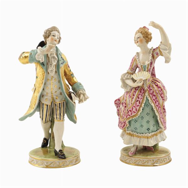 Coppia di figure in porcellana