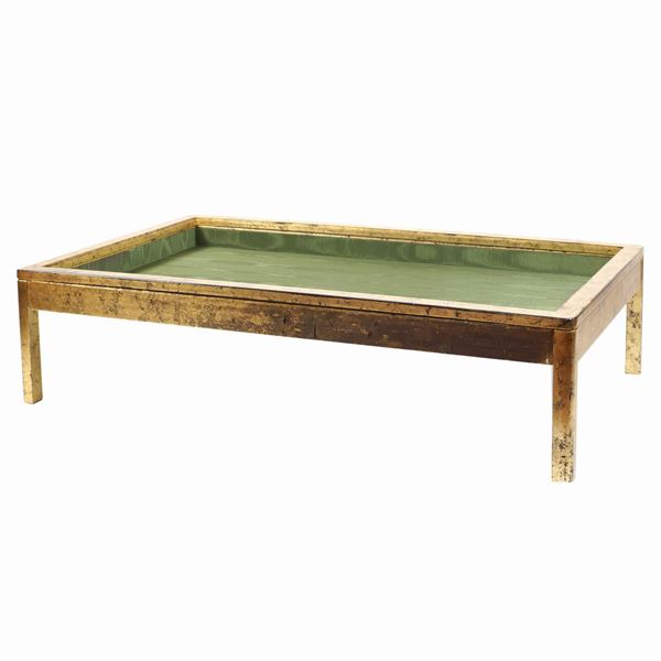 A wooden and crystal display table