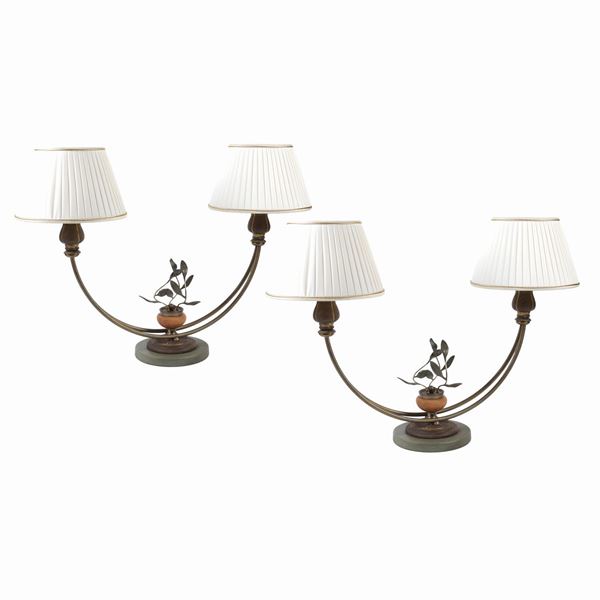 Coppia di lampade in metallo dorato
