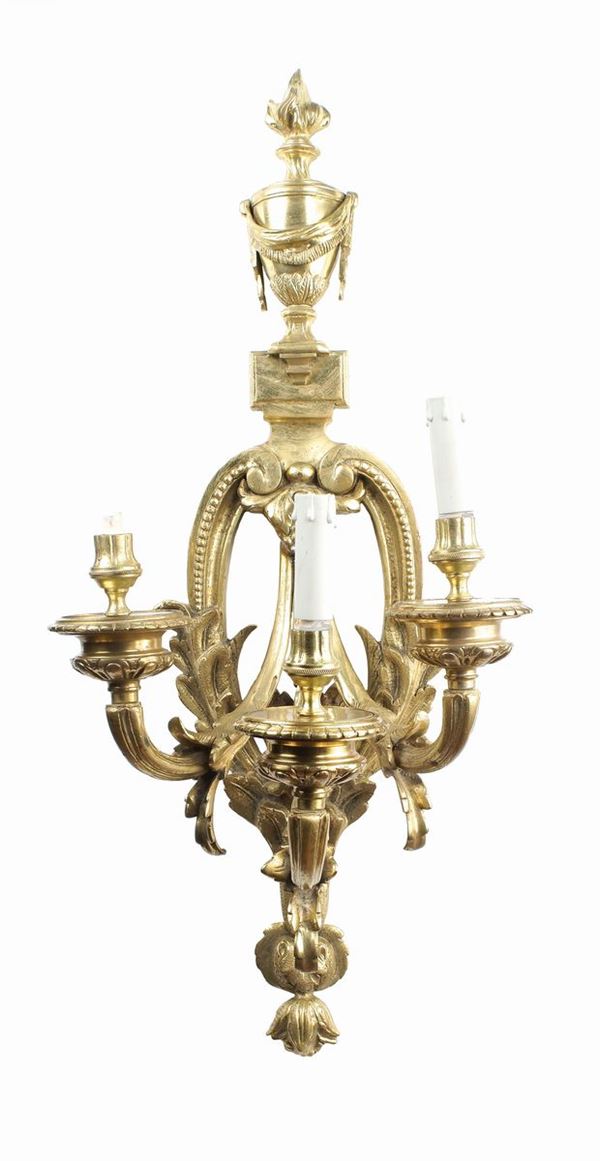 A gilt-bronze three-branch wall-light