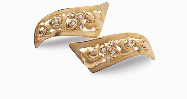 A pair of 18K gold and diamond earrings