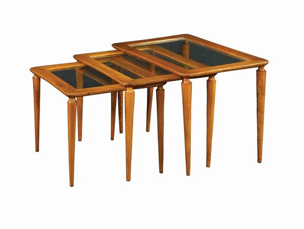 A set of three Italian walnutwood tables (3)