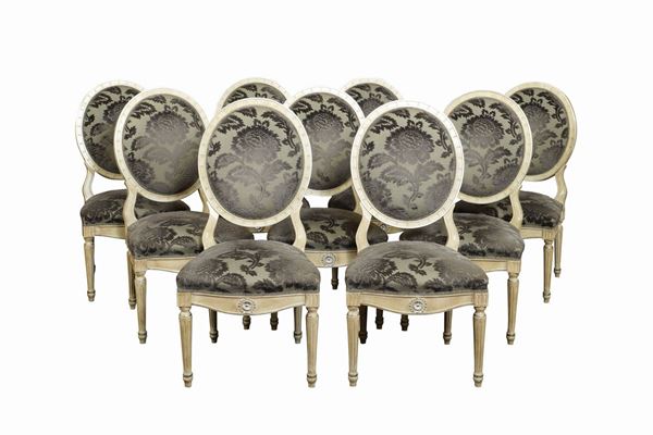 A set of lacquered wood chairs (14)