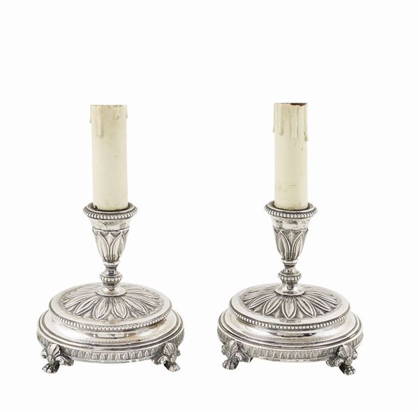 Coppia di candelieri in argento 800