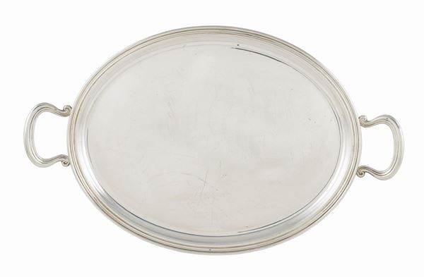A silver oval tray with two handles