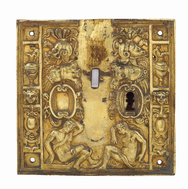 An antique bronze keyhole