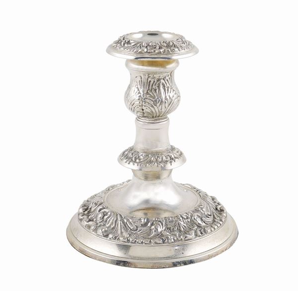 A silver metal candlestick