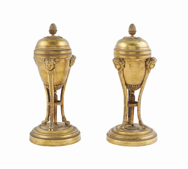 A pair of gilt bronze cassolettes
