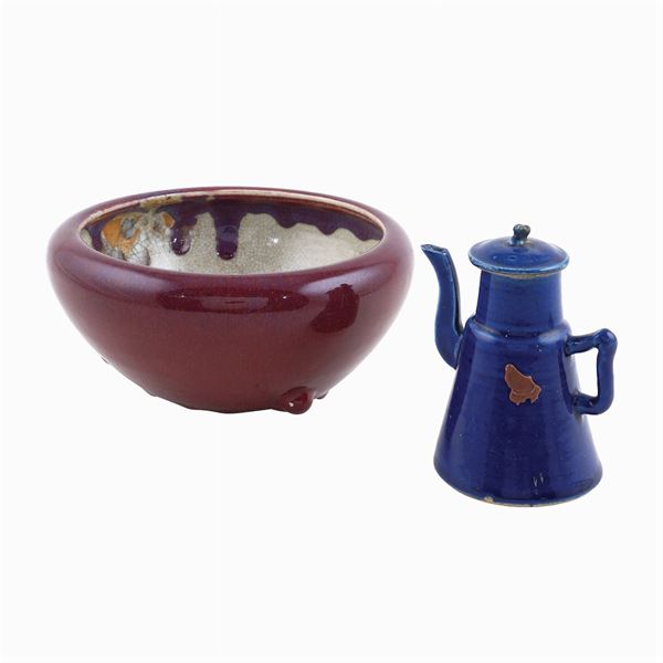 An enamelled ceramic bowl and teapot
