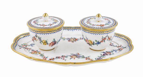 A porcelain mostardiera with two ampoules