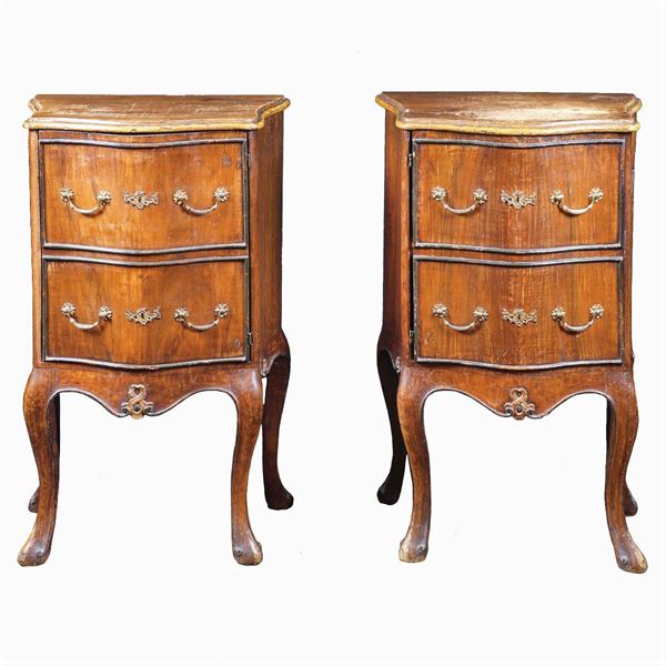 A pair of walnut night tables