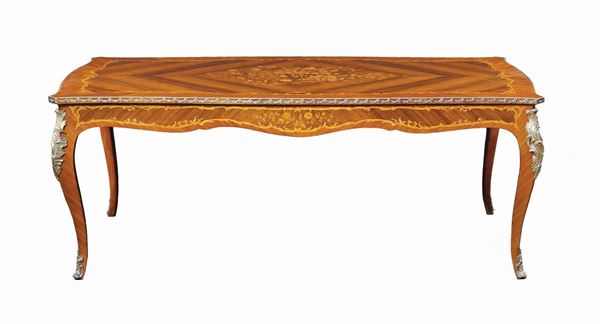 A rosewood and bois de rose table
