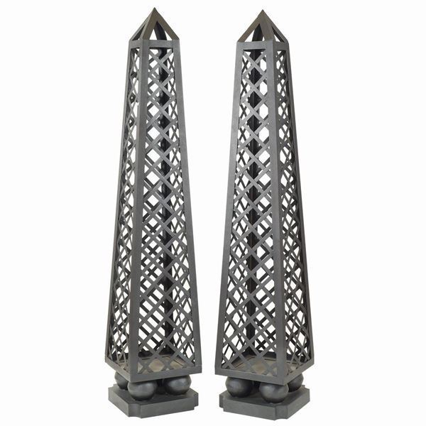A pair of iron obelisks
