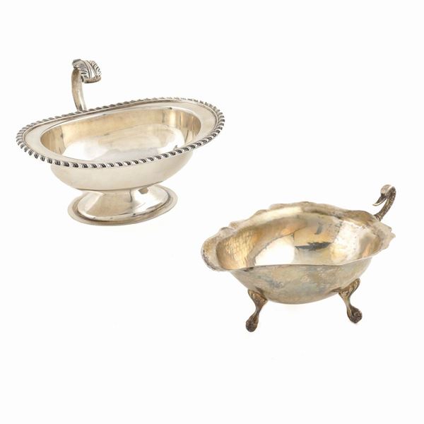 A pair of 800 silver sauce boat