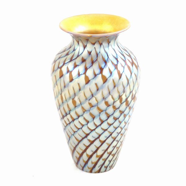 A Lundberg Studios polychromatic glass jar