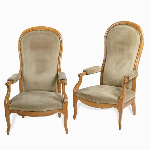 A pair of Louis Philippe reclining armchairs