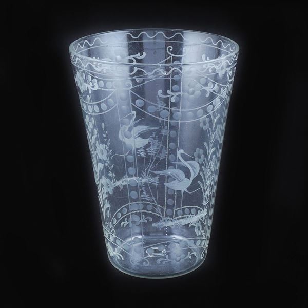 A carved glass jar