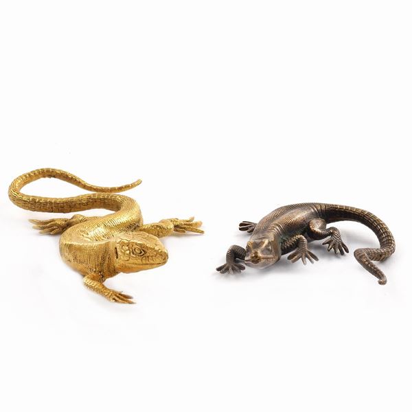 Coppia di fermacarte in bronzo dorato