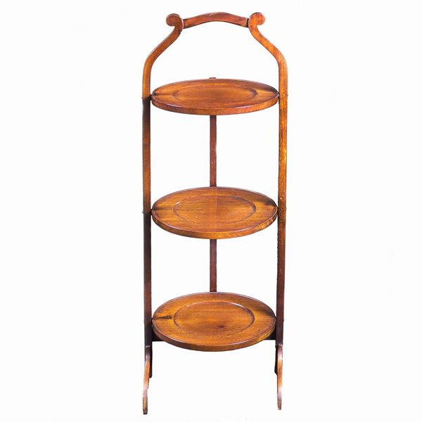 A mahogany folding etagere with three shelves