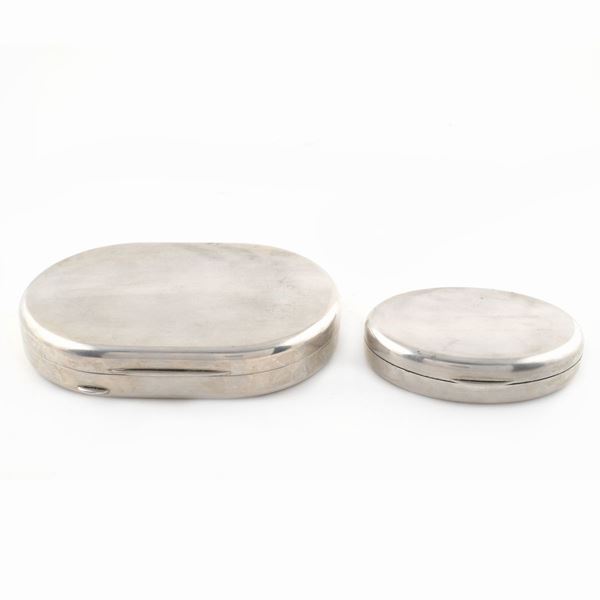 Due scatole ovali in argento 800
