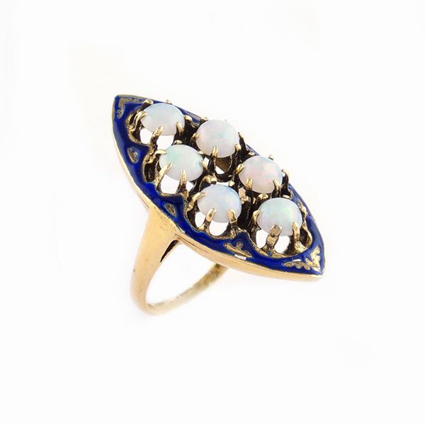 A 14kt gold and blue enamel ring