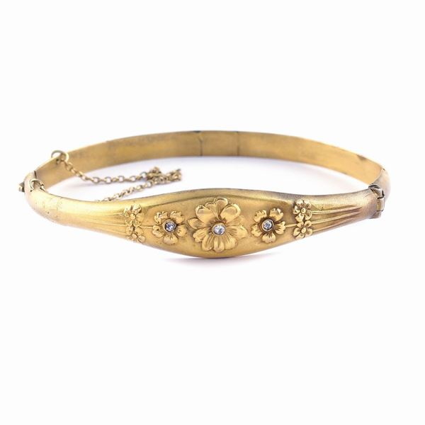 Bracciale manetta in oro giallo 12kt