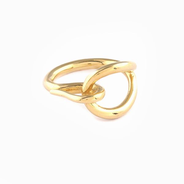 A Hermes gilt metal knot ring