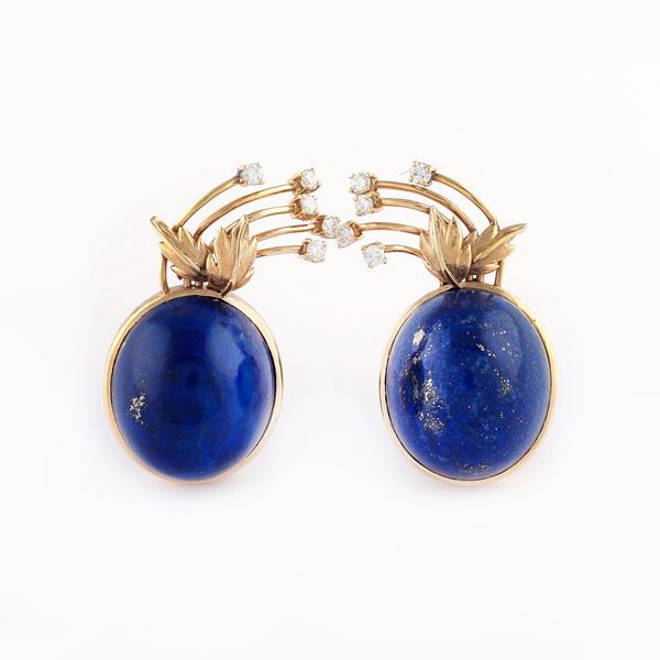 A pair of 18kt gold earrings