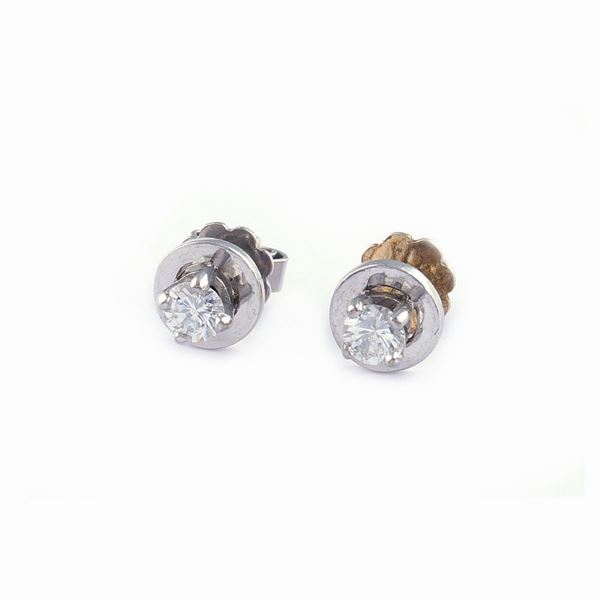 Orecchini punto luce in oro bianco 18kt