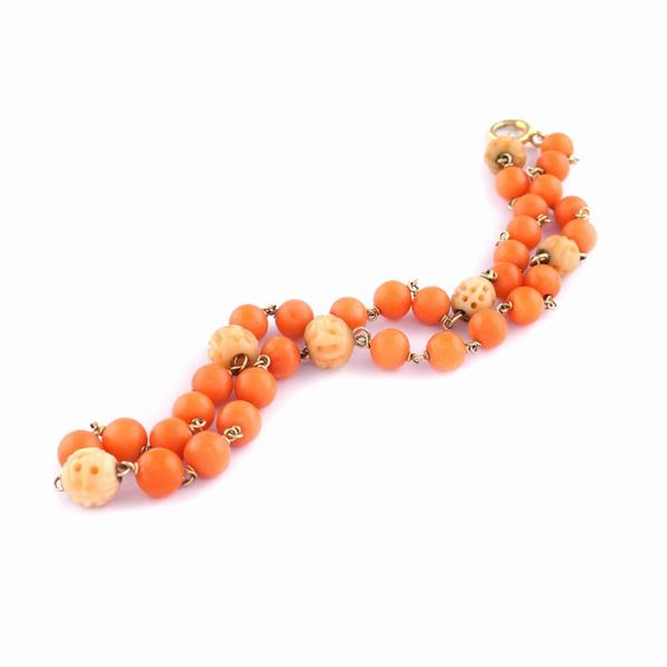 A 14kt gold and coral collier