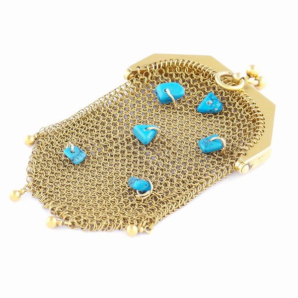 An 18kt gold pendant bag shaped