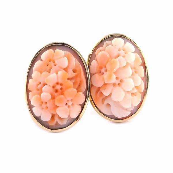 An 18kt gold and mediterranean coral earrings