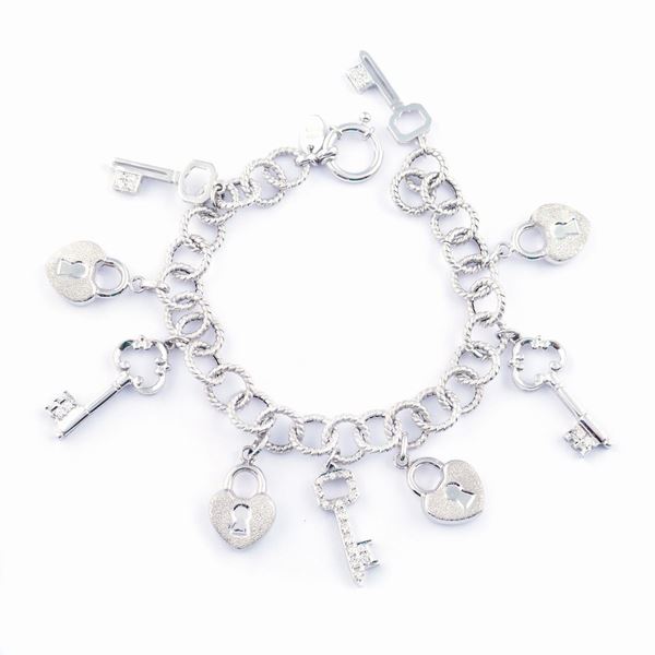 Bracciale charms in oro bianco 18kt e diamanti