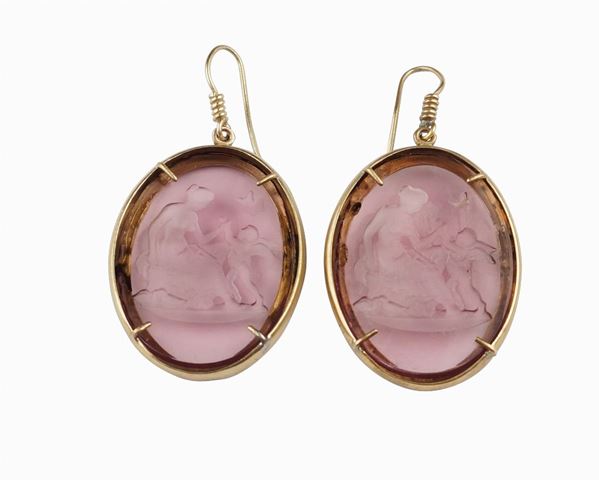 A silver gilt pendants earrings
