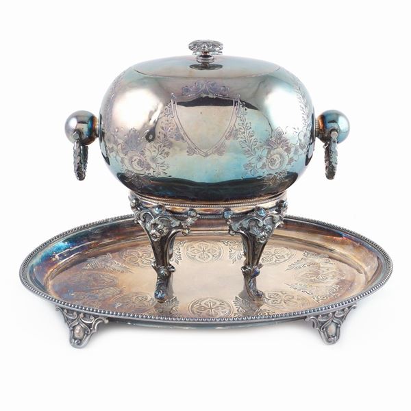 A silver plate sauce boat