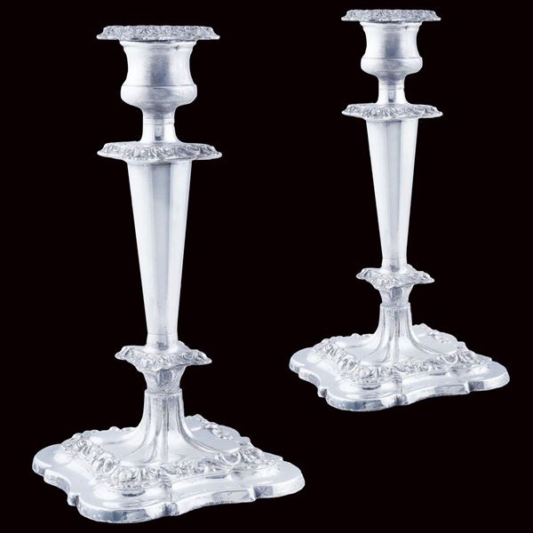 A pair of silver plate candlesticks