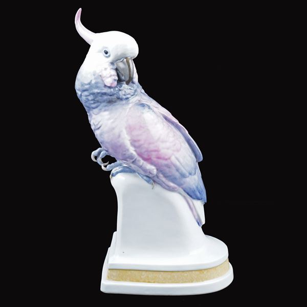 A porcelain parrot sculpture
