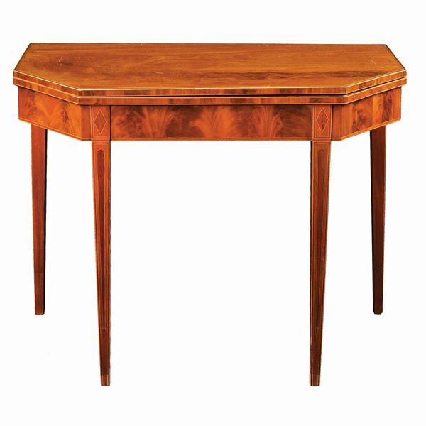 A mahogany and fruit woods console