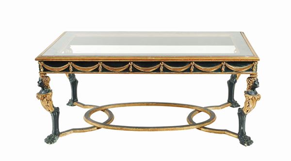 A lacquered and giltwood table