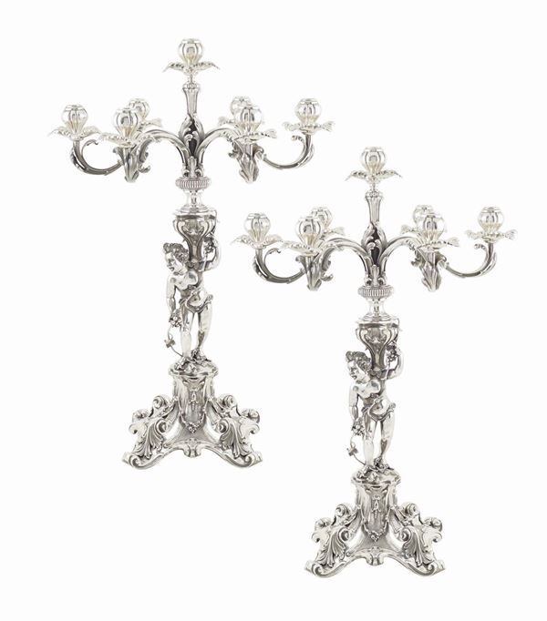 A pair of 800 silver candelabra