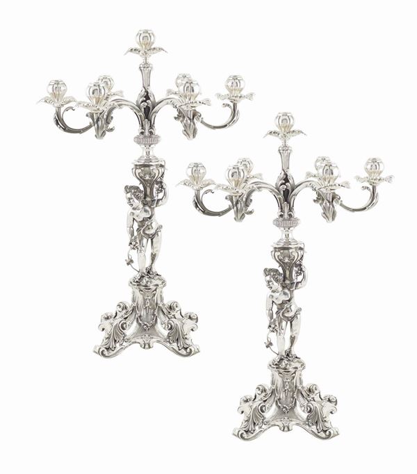 Coppia di candelabri in argento 800