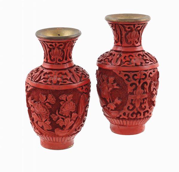 A pair of red lacquered jars
