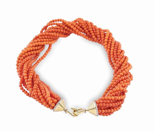 An 18kt gold and coral torchon collier