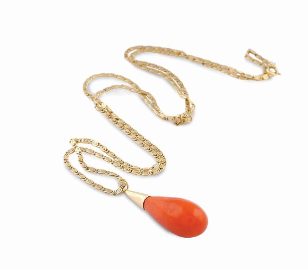 An 18kt gold and red coral pendant