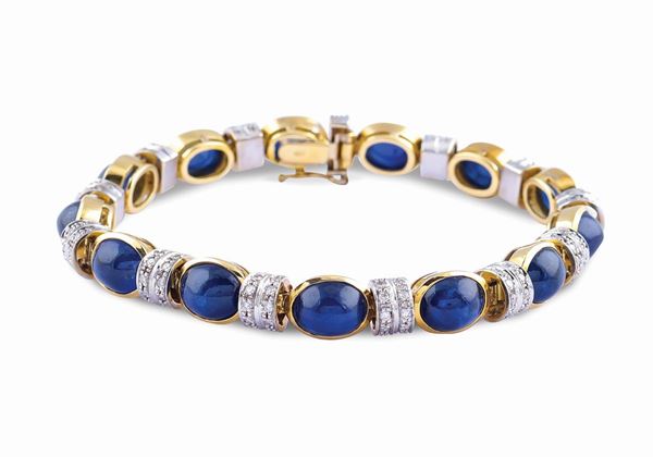 Bracciale in oro giallo e bianco 18kt e zaffiri naturali