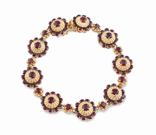 Bracciale a motivo floreale in oro giallo 18kt