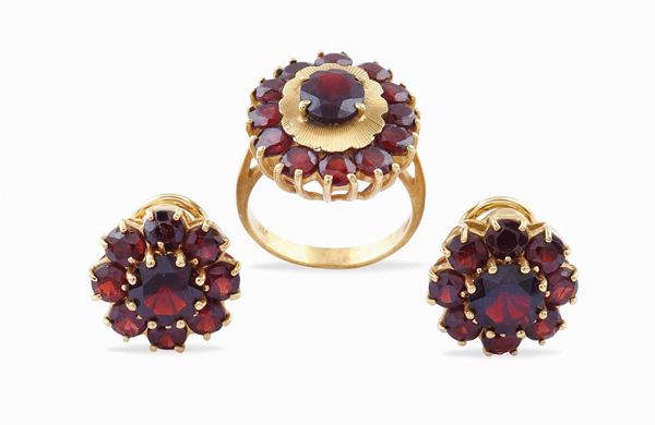 Parure in oro giallo 18kt e granati