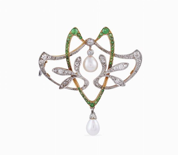 An 18kt gold and white gold Liberty brooch