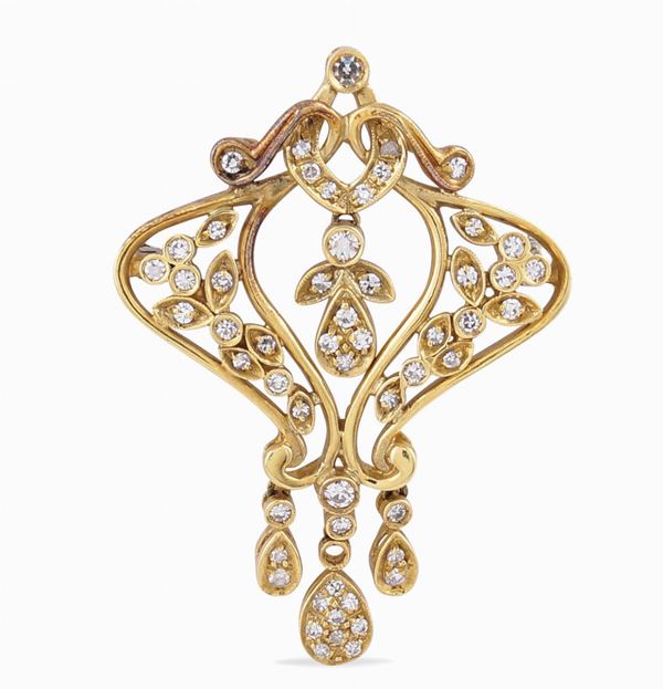 Spilla disegno Liberty in oro giallo 18kt
