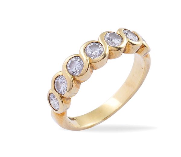 Anello rivière in oro giallo 18kt e diamanti